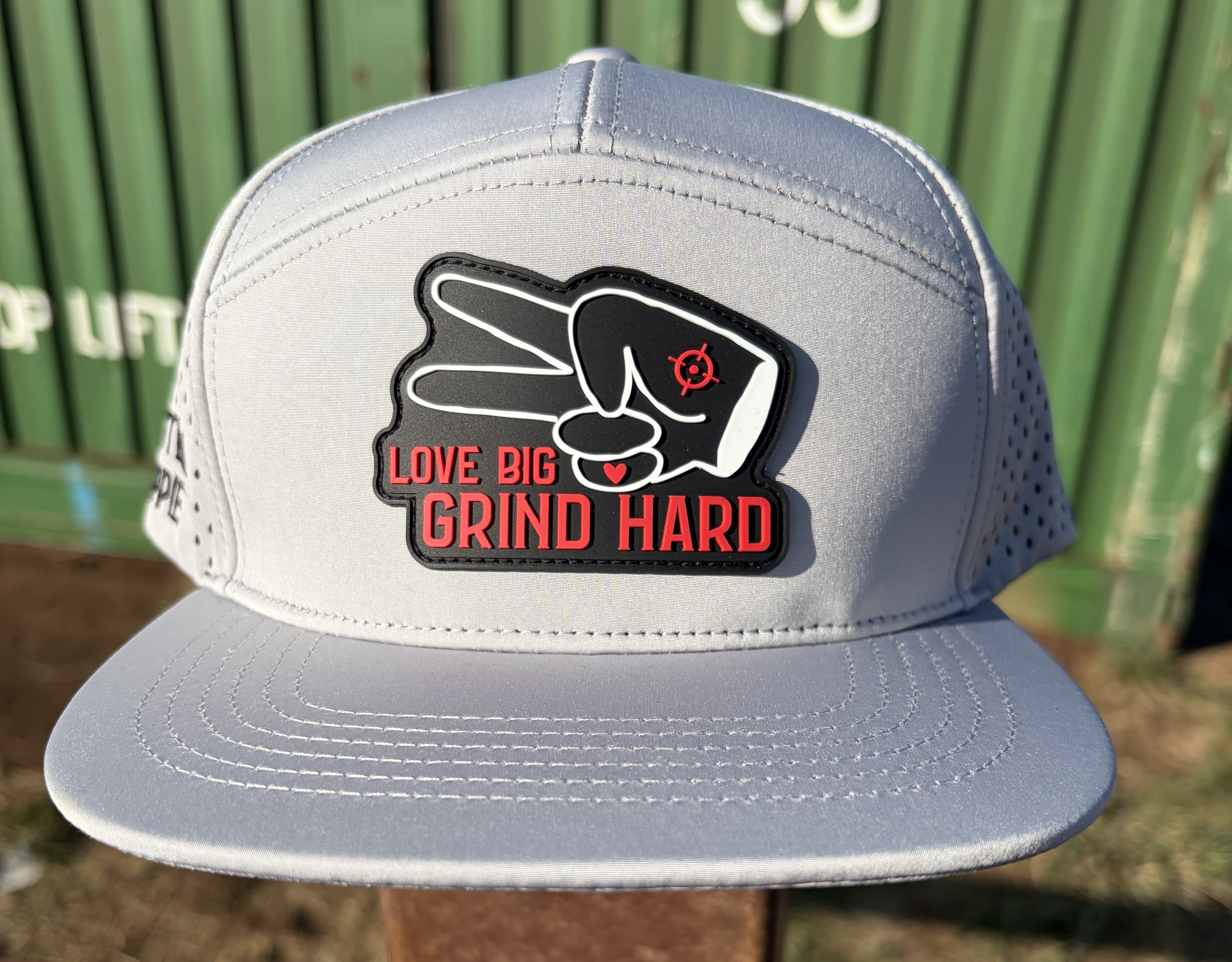 Gray Love Big Grind Hard hydro snapback hat with black and red rubber patch front logo
