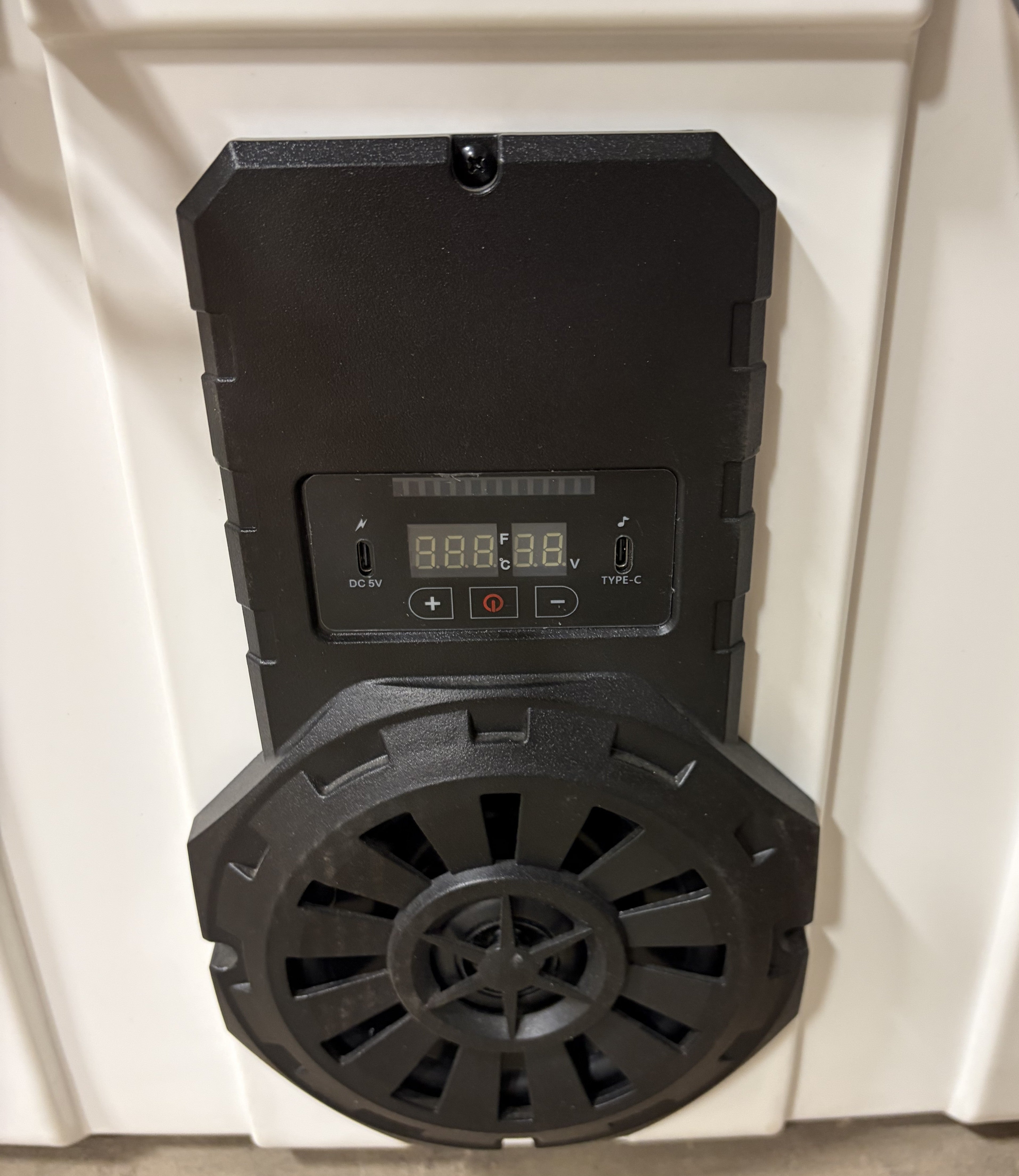 Close-up of Hound Boxx cooler speaker system with LED display, temperature readout, Bluetooth controls and built-in audio speaker