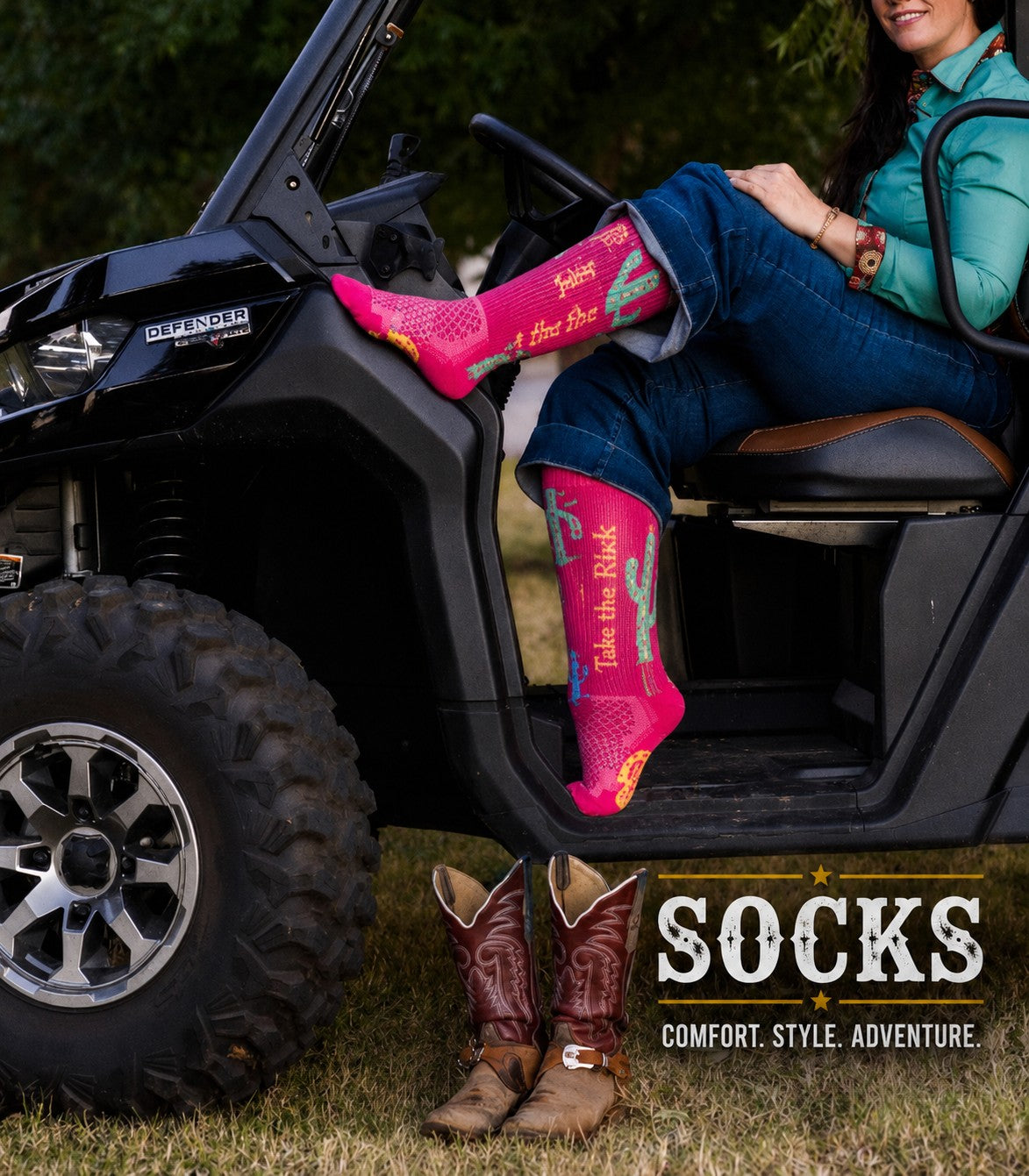 Western lifestyle socks for outdoor adventures, featuring colorful knee-high socks in a UTV from the Hustlin Hippie Socks Collection.