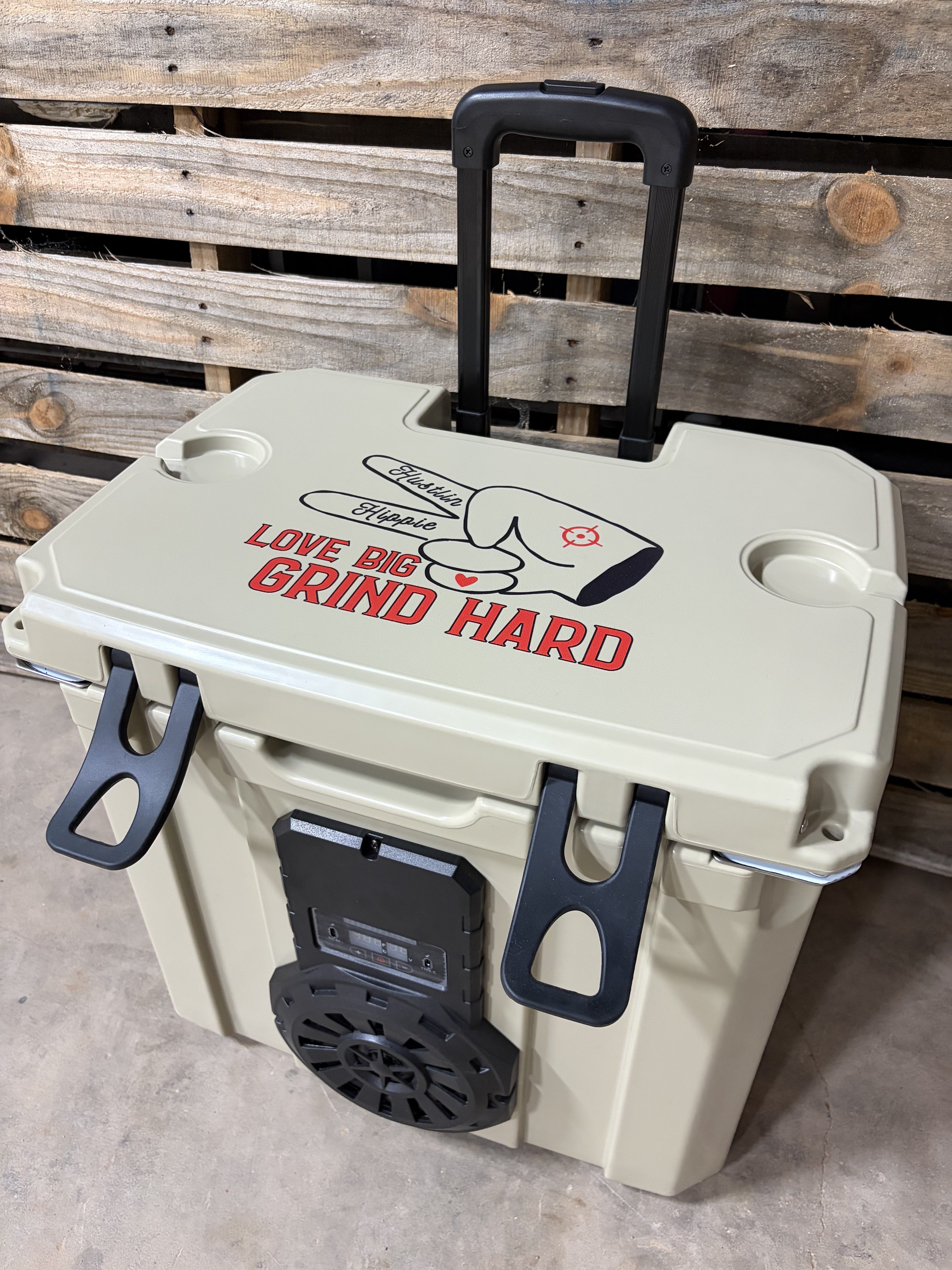 Tan Mono Hound Boxx Bluetooth speaker cooler with pull handle, rugged latches and built-in Bluetooth speaker system