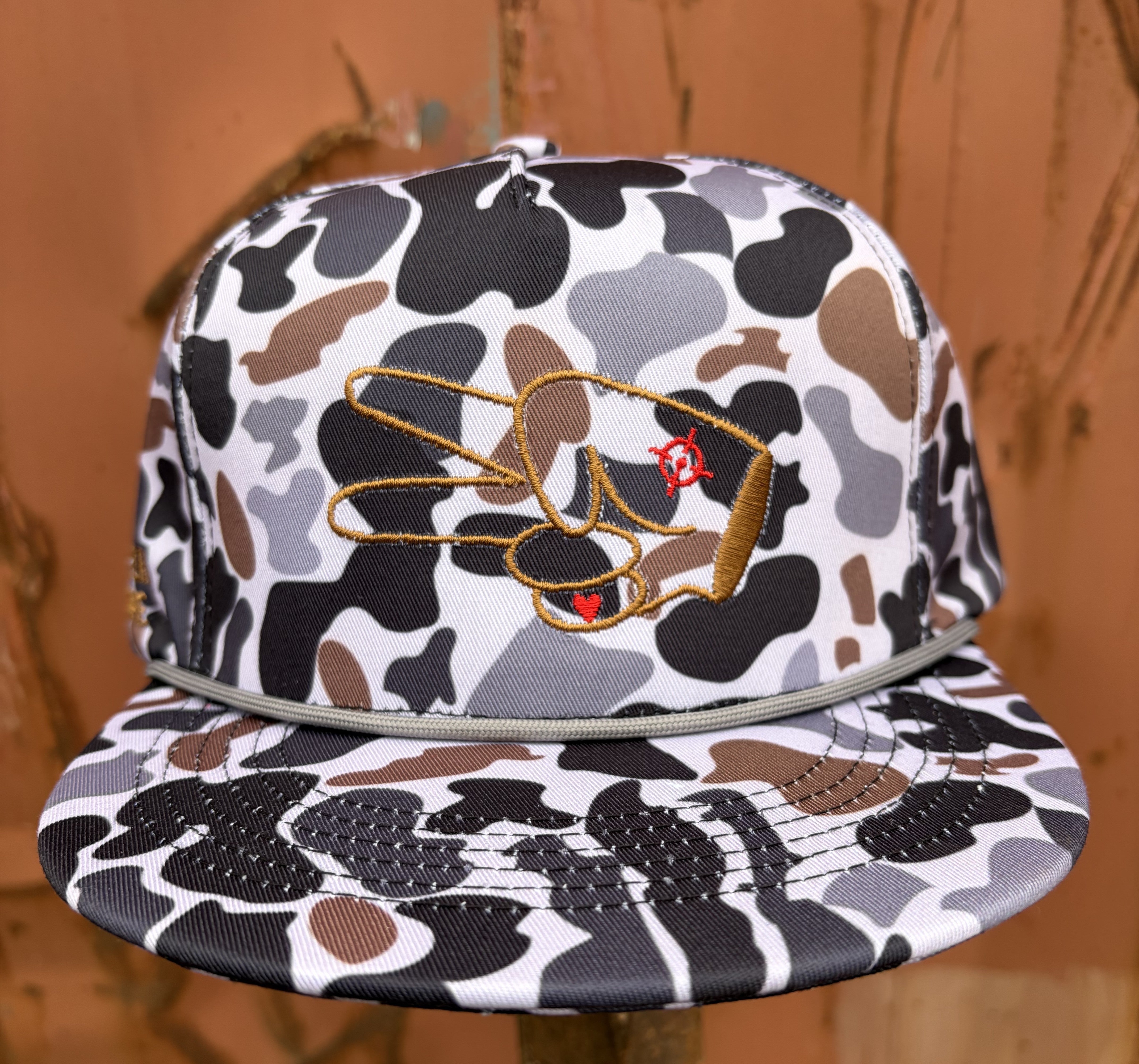 Front view of the Hustlin Hippie Signature Midnight Camo rope snapback hat with signature embroidered peace hand logo and rope detail.